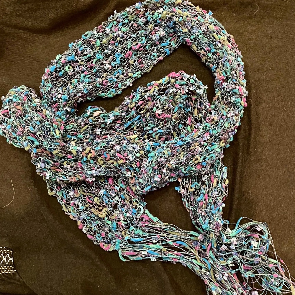 Multi colored lightweight hand knitted fun scarf